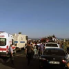 Lực lượng cứu hộ làm nhiệm vụ tại hiện trường vụ đánh bom xe ở Thổ Nhĩ Kỳ. (Nguồn: THX/TTXVN)