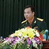 Đại tá Hoàng Xuân Vinh, vận động viên bắn súng của Việt Nam phát biểu tại buổi lễ. (Ảnh: An Đăng/TTXVN)