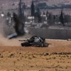Xe tăng của quân đội Thổ Nhĩ Kỳ tham gia chiến dịch chống IS tại khu vực biên giới Syria-Thổ Nhĩ Kỳ ngày 4/9. (Nguồn: AFP/TTXVN)