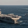 Tàu sân bay Mỹ USS Ronald Reagan (trái) tham gia diễn tập hải quân chung với Lực lượng Hải quân Hàn Quốc ngoài khơi bờ biển phía đông Hàn Quốc ngày 28/10. (Nguồn: Yonhap/TTXVN)
