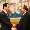 Thủ tướng Chính phủ Nguyễn Xuân Phúc tiếp Phó Chủ tịch Chính hiệp toàn quốc Trung Quốc Vương Gia Thụy. (Ảnh: Thống Nhất/TTXVN)