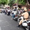 Cảnh sát giao thông Hà Nội đang làm nhiệm vụ đảm bảo an toàn giao thông trên đường Hai Bà Trưng - Hà Nội. (Ảnh Nguyễn Văn Cảnh/TTXVN)