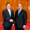 Thủ tướng Nguyễn Xuân Phúc tiếp ông Quách Thanh Côn, Bộ trưởng Bộ Công an Trung Quốc đang có chuyến thăm và làm việc tại Việt Nam. (Ảnh: Thống Nhất/TTXVN)
