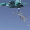 Hình ảnh máy bay Nga ném bom xuống Syria sau khi cất cánh từ căn cứ quân sự ở Iran (Nguồn: Reuters)