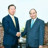 Thủ tướng Nguyễn Xuân Phúc tiếp ông Jung Young Soo, Cố vấn Toàn cầu cao cấp, Tập đoàn CJ, Hàn Quốc. (Ảnh: Thống Nhất/TTXVN)