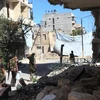 Binh sỹ Chính phủ Syria tuần tra tại Suleiman al-Halabi, khu vực ngoại ô Aleppo ngày 30/9. (Nguồn: AFP/TTXVN)