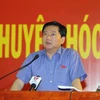 Bí thư Thành ủy Đinh La Thăng phát biểu tại buổi tiếp xúc cử tri huyện Hóc Môn. (Ảnh: Thanh Vũ/TTXVN)