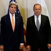 Ngoại trưởng Mỹ John Kerry (trái) và Ngoại trưởng Nga Sergei Lavrov trong một cuộc gặp ở Geneva, Thụy Sĩ ngày 9/9. (Nguồn: AFP/TTXVN)