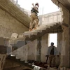 Binh sỹ Syria làm nhiệm vụ tại khu vực ngoại ô Manbij, Aleppo ngày 15/6. (Nguồn: AFP/TTXVN)