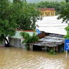 Hàng trăm nhà dân, trường học ở xã An Định (huyện Tuy An, Phú Yên) bị ngập trong nước. (Ảnh: Thế Lập/TTXVN)