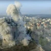 Khói bốc lên sau các cuộc giao tranh tại Aleppo. (Nguồn: AP/TTXVN)