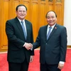 Thủ tướng Nguyễn Xuân Phúc tiếp Phó Thủ tướng Lào Sonsay Siphandone. (Ảnh: Thống Nhất/TTXVN)