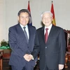 Tổng Bí thư Nguyễn Phú Trọng tiếp Chủ tịch Ủy ban Trung ương Mặt trận Lào xây dựng đất nước Saysomphone Phomvihane. (Ảnh: Trí Dũng/TTXVN)