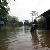 Điểm nước sâu gây chia cắt 350 hộ dân ở thôn Kim Thành. (Ảnh: Sỹ Thắng/TTXVN)