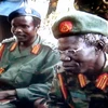 Thủ lĩnh Joseph Kony và trợ lý thân cận Vincent Otti tại Kampala, ngày 24/5/2006. (Nguồn: AFP/TTXVN)