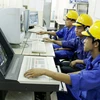 Điều hành sản xuất điện tại Công ty CP mía đường Bourbon Tây Ninh. (Ảnh: Kim Phương/TTXVN)