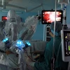 Ca phẫu thuật nội soi bằng robot cắt bỏ tuyến tiền liệt cho bệnh nhân Đ. T. Q (SN 1950) vào chiều 10/12 là ca phẫu thuật thứ 10 bệnh viện thực hiện phẫu thuật nội soi bằng robot. (Ảnh: Phương Vy/TTXVN)
