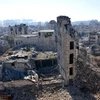 Cảnh đổ nát do xung đột ở Qastal al-Harami, khu vực lân cận Aleppo ngày 9/12. (Nguồn: AFP/TTXVN)
