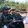 Các chiến sỹ quân đội Lào trong lễ diễu binh. (Ảnh: Phạm Kiên/Vietnam+)