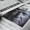 Ảnh chân dung Tổng thống đắc cử Mỹ Donald Trump được đăng trên một tờ báo tại Bắc Kinh ngày 10/11. (Nguồn: AFP/TTXVN)