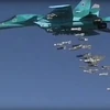 Máy bay Sukhoi Su-34 của Nga tại căn cứ không quân Hamedan, Iran, chuẩn bị tiến hành vụ không kích nhằm vào các mục tiêu IS tại Deir ez-Zor, Syria ngày 18/8. (Nguồn: EPA/TTXVN)