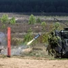 Xe tăng quân sự tham gia cuộc tập trận ở Pabrade, Litva. (Nguồn: THX/TTXVN)