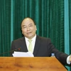 Thủ tướng Nguyễn Xuân Phúc dự và phát biểu tại Hội nghị trực tuyến Triển khai nhiệm vụ công tác Y tế năm 2017. (Ảnh: Thống Nhất/TTXVN)
