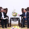 Thủ tướng Nguyễn Xuân Phúc tiếp ông Kamal Malhotra, Điều phối viên thường trú kiêm Trưởng đại diện Chương trình phát triển Liên Hợp quốc tại Việt Nam. (Ảnh:Thống Nhất/TTXVN)