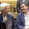 Giám đốc IMF Christine Lagarde (trái) và Bộ trưởng Tài chính Hy Lạp Euclid Tsakalotos tại Hội nghị các Bộ trưởng Tài chính khu vực đồng tiền chung châu Âu ở Brussels, Bỉ ngày 12/7/2015. (Nguồn: AFP/TTXVN)