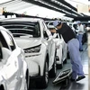 Dây chuyền sản xuất ôtô Toyota tại nhà máy Miyata ở Miyawaka, tỉnh Fukuoka, Nhật Bản ngày 8/8/2014. (Nguồn: AFP/TTXVN)
