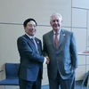 Phó Thủ tướng, Bộ trưởng Ngoại giao Phạm Bình Minh có cuộc gặp với Bộ trưởng Ngoại giao Hoa Kỳ Rex Tillerson. (Ảnh: Phạm Văn Thắng/TTXVN)