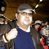 Người đàn ông được cho là Kim Jong-nam (giữa) tại sân bay Bắc Kinh, Trung Quốc ngày 11/2/2007. (Nguồn: AFP/TTXVN)