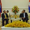 Chủ tịch nước Lào tại buổi hội đàm với Thủ tướng Campuchia. (Nguồn: Cơ quan thường trú TTXVN tại Campuchia)