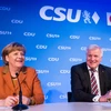 Thủ tướng Đức Angela Merkel (trái) và Lãnh đạo đảng Liên minh Xã hội Cơ đốc giáo (CSU) Horst Seehofer tại một hội nghị ở Munich ngày 6/2. (Nguồn: EPA/TTXVN)