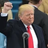 Tổng thống đắc cử Donald Trump đọc lời tuyên thệ tại Washington, DC, ngày 20/1. (Nguồn: AFP/TTXVN)