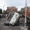 Hiện trường sau vụ đánh bom ở Damascus, Syria ngày 11/3. (Nguồn: THX/TTXVN)