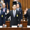 (từ trái sang): Chủ tịch Tập đoàn SK Chey Tae-Won, Phó Chủ tịch Samsung Lee Jae-yong và Chủ tịch Lotte Shin Dong-Bin tại phiên điều trần của Quốc hội Hàn Quốc ở thủ đô Seoul ngày 6/12/2016. (Nguồn: AP/TTXVN)