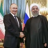 Tổng thống Nga Vladimir Putin gặp Tổng thống Iran Hassan Ro​uhani​. (Nguồn: AP)