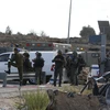 Lực lượng an ninh Israel làm nhiệm vụ tại hiện trường một vụ tấn công ở Nablus, Bờ Tây. (Nguồn: AFP/TTXVN)