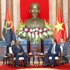 Chủ tịch nước Trần Đại Quang tiếp Bộ trưởng Ngoại giao Cộng hòa Angola, Georges Rebelo Pinto Chikoti sang thăm chính thức Việt Nam. (Ảnh: Nhan Sáng/TTXVN)