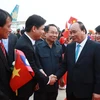 Lễ đón Thủ tướng Nguyễn Xuân Phúc và Phu nhân tại sân bay quốc tế Wattay. (Ảnh: Thống Nhất/TTXVN)