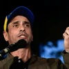 Thủ lĩnh Liên minh Bàn đoàn kết dân chủ (MUD) đối lập ở Venezuela, ông Henrique Capriles trong cuộc họp báo tại Caracas ngày 7/4. (Nguồn: AFP/TTXVN)