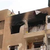 Tòa nhà bị hư hỏng sau cuộc không kích của liên quân quốc tế do Mỹ đứng đầu tại thị trấn Tabqa, cách Raqa 55km về phía tây ngày 18/5. (Nguồn: AFP/TTXVN)