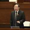 Bộ trưởng Bộ Nông nghiệp và Phát triển Nông thôn Nguyễn Xuân Cường trả lời chất vấn của Đại biểu Quốc hội. (Ảnh: Phương Hoa/TTXVN)