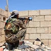 Binh sỹ Syria làm nhiệm vụ tại thành phố Raqqa ngày 11/6. (Nguồn: EPA/TTXVN)
