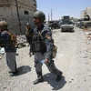 Lực lượng Iraq tuần tra tại Mosul ngày 17/6. (Nguồn: AFP/TTXVN)