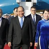 Thủ tướng Nguyễn Xuân Phúc và Phu nhân đến sân bay quốc tế Frankfurt. (Ảnh: Thống Nhất/TTXVN)