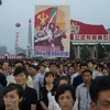 Người dân Triều Tiên tham dự một buổi lễ tại thủ đô Bình Nhưỡng ngày 6/7. (Nguồn: AFP/TTXVN)