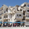Cảnh đổ nát sau các cuộc giao tranh tại Syria. (Nguồn: AFP/TTXVN)