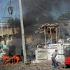 Hiện trường một vụ đánh bom ở Mogadishu ngày 22/6. (Nguồn: EPA/TTXVN)